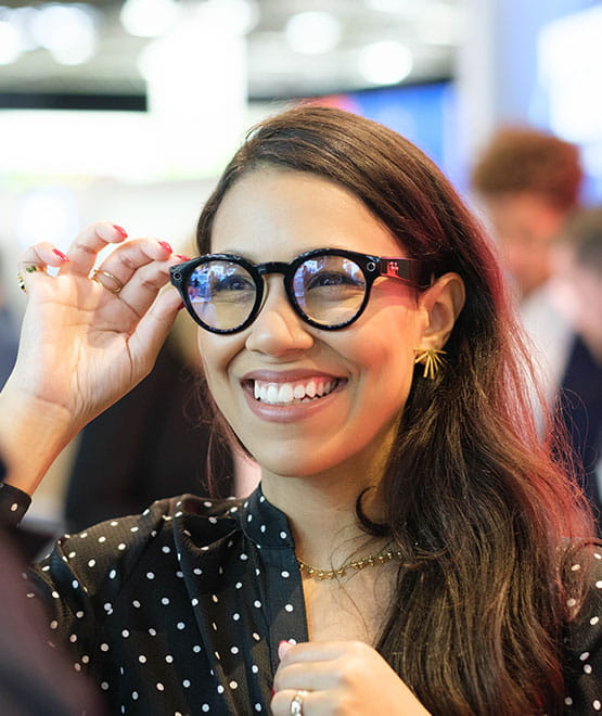 Woman wearing glasses and smiling