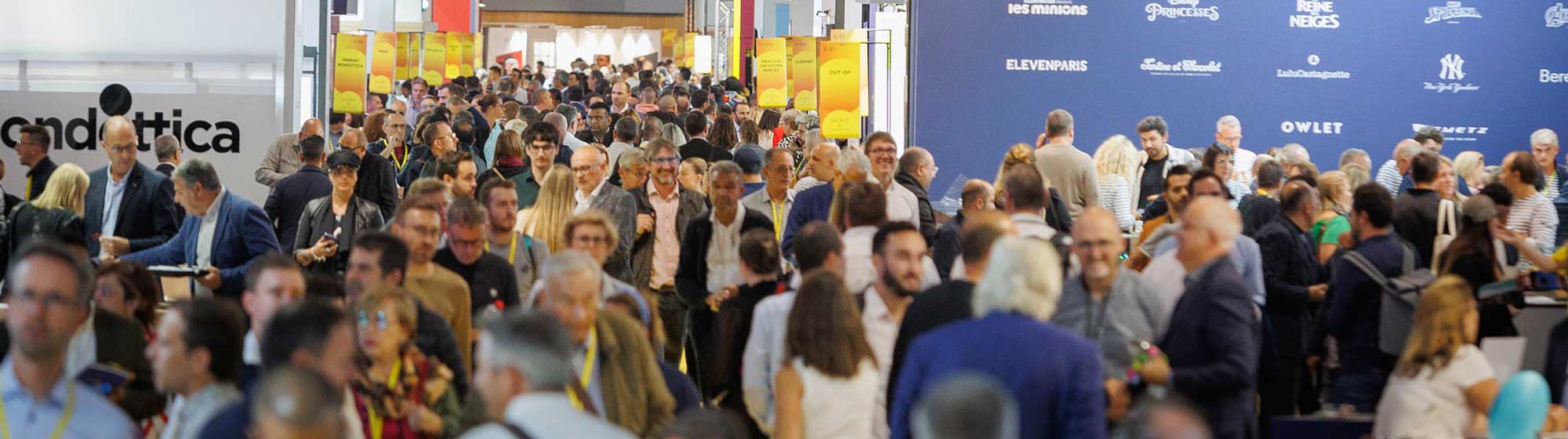 Crowd of visitors in the showroom