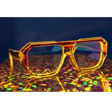 Futuristic yellow glasses with an iridescent background, exemplifying bold design and innovation in eyewear, winner of the SILMO d'Or 2022 in the category OPTICAL FRAME « EYEWEAR DESIGNER »