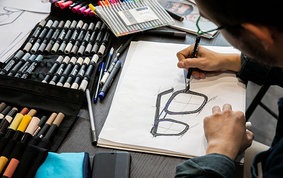 Man designing glasses