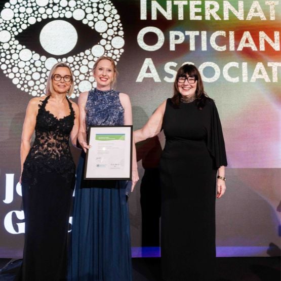 Three women at the International Optician Award prize-giving ceremony