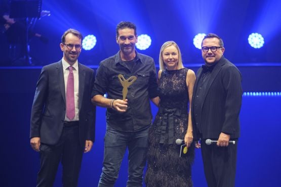 Group receiving the SILMO d'Or award in the Sport category during the prize ceremony